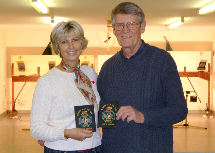 Photograph shows Hayley Platts (pictured left) and Vic Jagiello (pictured right) proudly displaying their Inter-County Air Pistol League - Division 3 - 2018/2019 - Winners Blazer Badges.