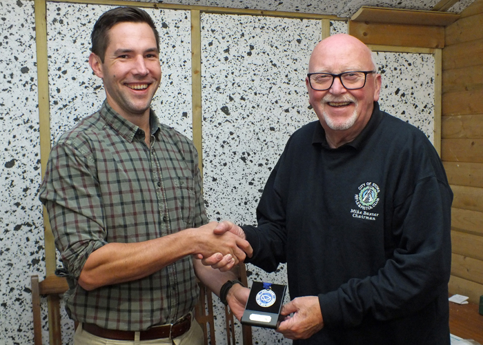 Photograph shows City of Stoke RPC Chairman - Mike Baxter (pictured right) presenting Fraser Philp (pictured left) with his SSRA Individual 10 Metres Air Pistol League 1st Place Medal.