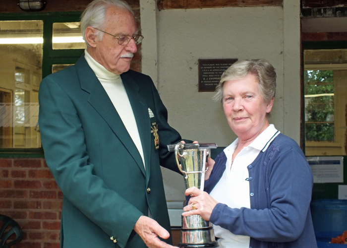 Photograph shows SSRA President - Major (Retired) Peter Martin MBE, pictured left - presenting the Moat Cup and First Place Medal to Mrs. M. Bayley, pictured right.