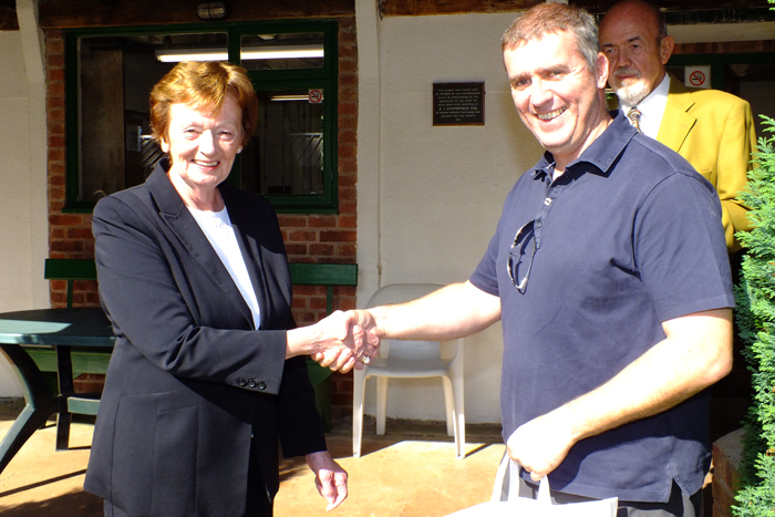 Photograph shows Mary Jennings, pictured left, presenting the Class C 1st Place Prize to Stuart Powell, pictured right.