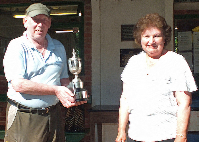 Photograph shows Mrs. Janet Troke (pictured right), presenting the Chipperfield Cup to Brian Parker (pictured left).