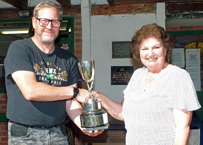 Photograph shows Mrs. Janet Troke (pictured right), presenting the Swynnerton Cup to Paul Baron (pictured left).