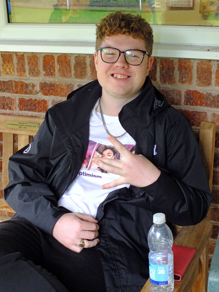 Photograph shows Alex Buttery calmly relaxing as the competition is in full swing.