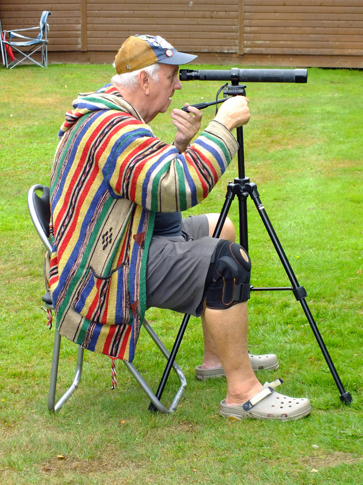 Photograph shows Lee Featherstone intently casting his eagle-eye over something in the distance ... is it a bird ... is it a plane ... who knows!