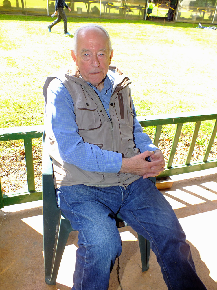 Photograph shows SSRA Trophies Secretary - Dave Bayley - taking time-out to relax under the cover of the verandah.