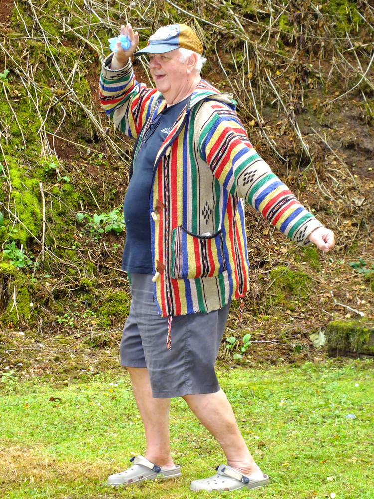 Photograph shows a lively Lee Featherstone apparently continuing his "sunshine dance" to ward off any further rain clouds. It's working very well too! Keep it up!