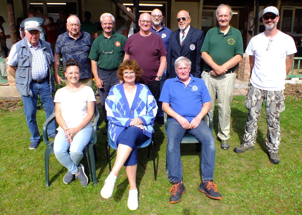 Photograph shows members of Market Drayton Rifle Club whom kindly assembled for a group photograph.  Back row (left to right) are Fred Dukes, John Wilshaw, Tony Errington, Jeff Hickson, Mark Evans, Richard Tilstone, Bob Heath, Alan Williams.  Front row (left to right) are Natasha Minikin, Judith Simcock, Alan Boyles.