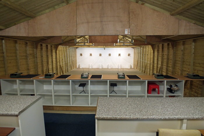 Photograph shows the Airgun Range interior - from behind the relocated firing points.