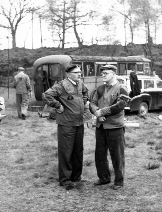 Photograph shows E.J. Chipperfield deep in conversation with a shooting colleague - it looks a serious topic too.
