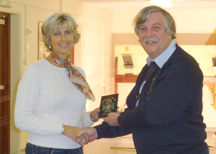 Photograph shows Osborn Spence - SSRA Airgun Secretary (pictured right) presenting the NSRA (680) Inter-County Air Pistol League - Division 3 - 2018/2019 - Winners Blazer Badge to Staffordshire Team Member Hayley Platts (pictured left).