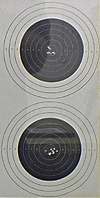 Photograph show in detail the superb accuracy of Peter's shooting on each target.