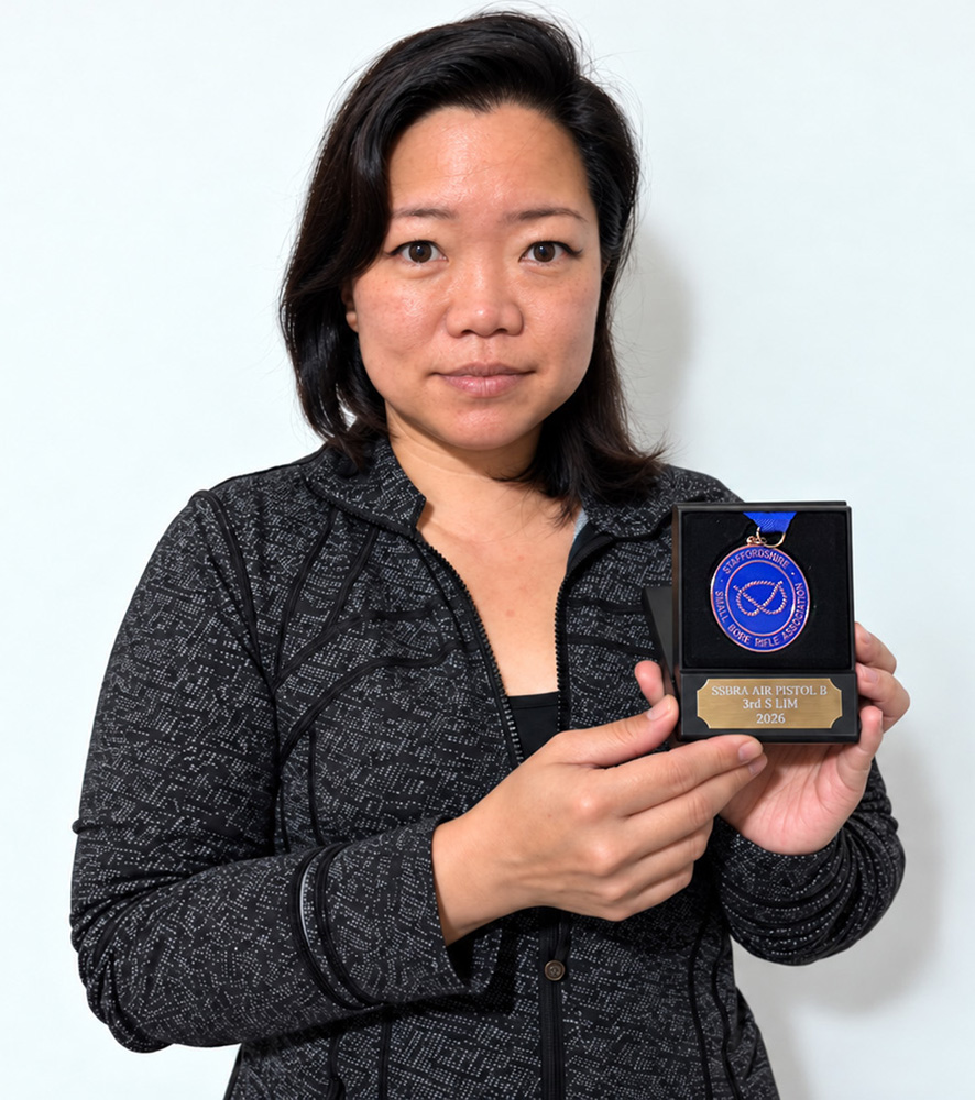 Photograph shows Shang Lim of Sutton Coldfield Rifle and Pistol Club proudly displaying her SSRA Individual 10 Metres Air Pistol - 'B' League - Summer 2026 - 3rd Place Medal.