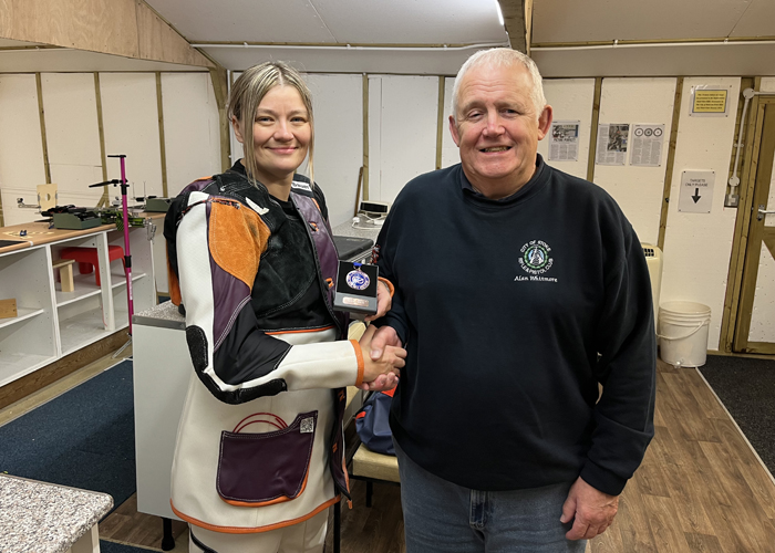 Photograph shows Alan Whitmore of City of Stoke RPC (pictured right) presenting Steph Reynolds of City of Stoke RPC (pictured left) with her SSRA Individual 10 Metres Air Rifle 'A' League 3rd Place Medal.