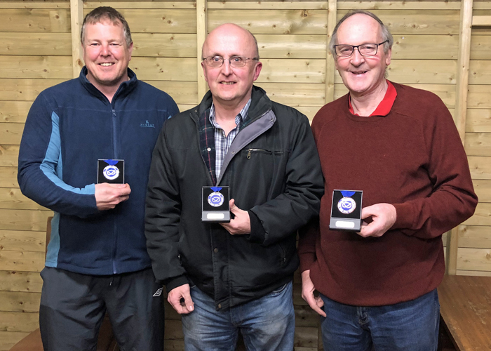 Photograph shows Dom Paskin - 2nd Place (pictured left), Les Tolley - 1st Place (pictured centre) , and Gordon Abbotts - 3rd Place (pictured right) with their medals.