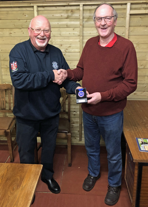 Photograph shows City of Stoke Chairman, Mike Baxter (pictured left), presenting Gordon Abbotts (pictured right) with his SSRA Individual Air Pistol 'B' League - 3rd Place Medal.