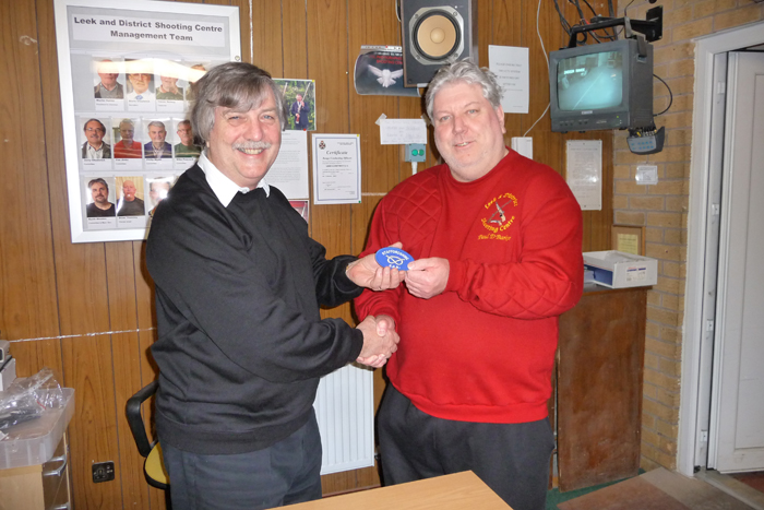 Photograph shows Osborn Spence - SSRA Airgun Secretary (pictured left) presenting the Staffordshire County Badge to Staffordshire Team Member Paul D. Barker (pictured right) for completing his first season shooting for Staffordshire at Inter-County level.