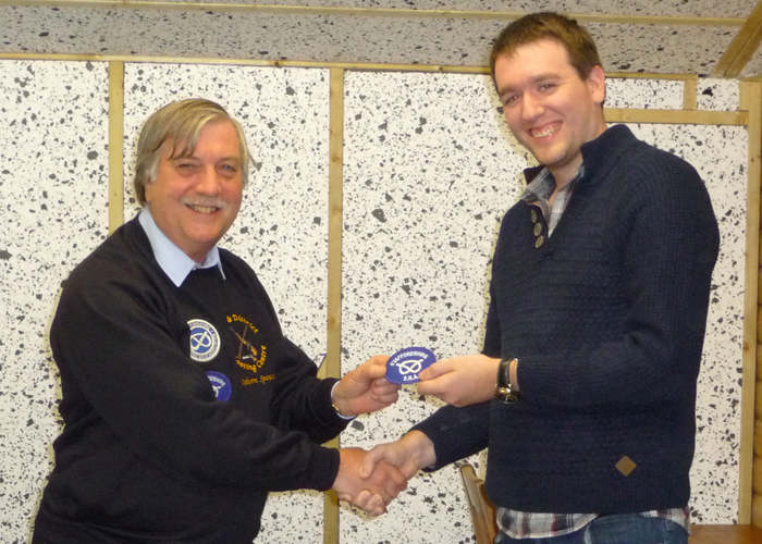Photograph shows Osborn Spence - SSRA Airgun Secretary (pictured left) presenting the Staffordshire County Badge to Staffordshire Team Member Brendan Lewin (pictured right).