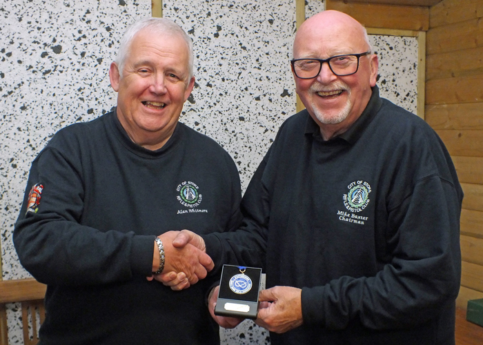 Photograph shows City of Stoke RPC Chairman - Mike Baxter (pictured right) presenting Alan Whitmore (pictured left) with his SSRA Individual 10 Metres Air Rifle 'B' League 1st Place Medal.