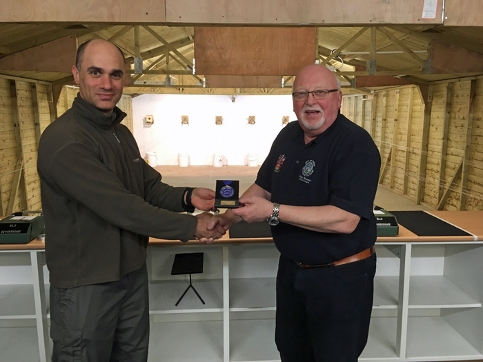 Photograph shows City of Stoke Chairman - Mike Baxter (pictured right) presenting City of Stoke shooter Theo Kyriacou (pictured left) with his SSRA Air Section - Individual Air Pistol League  - Winter 2016/2017 -Winners Medal.