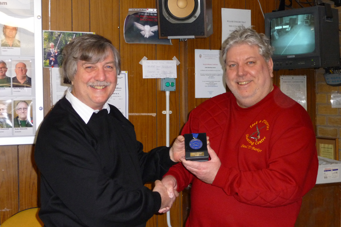 Photograph shows SSRA Airgun Secretary - Osborn Spence (pictured left) presenting Leek and District shooter Paul D Barker (pictured right) with his SSRA Air Section - Individual Air Rifle League - Winter 2016/2017 - Winner's Medal.