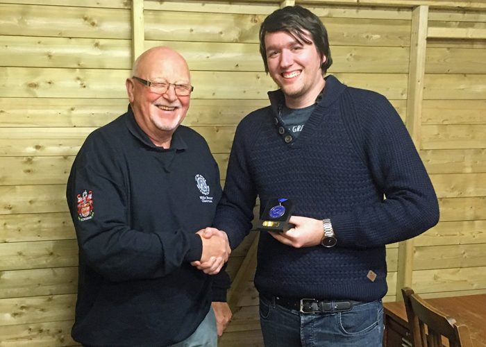 Photograph shows City of Stoke RPC Chairman - Mike Baxter (pictured left) presenting Brendon Lewin (pictured right) with his SSRA Air Pistol Individual League 1st Place Medal.