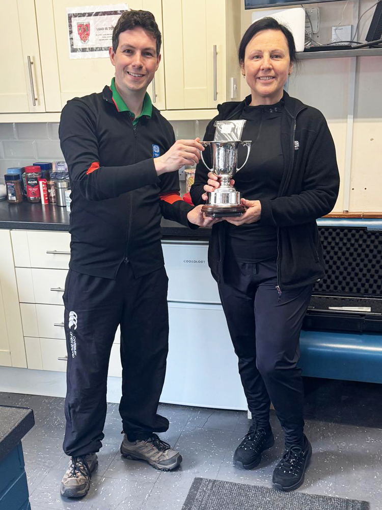 Photograph shows Debbie Truman of Rugelely RPC (pictured right) receiving the Col. N.C. Joseph Cup from Richard Hemingway (pictured left).