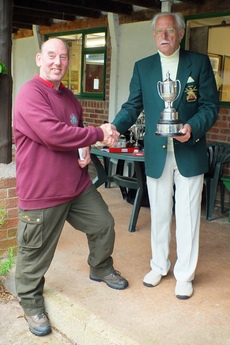 Photograph shows B. Parker (pictured left) receiving the Chipperfield Cup from SSRA President, Major (Retired) Peter Martin, MBE (pictured right).