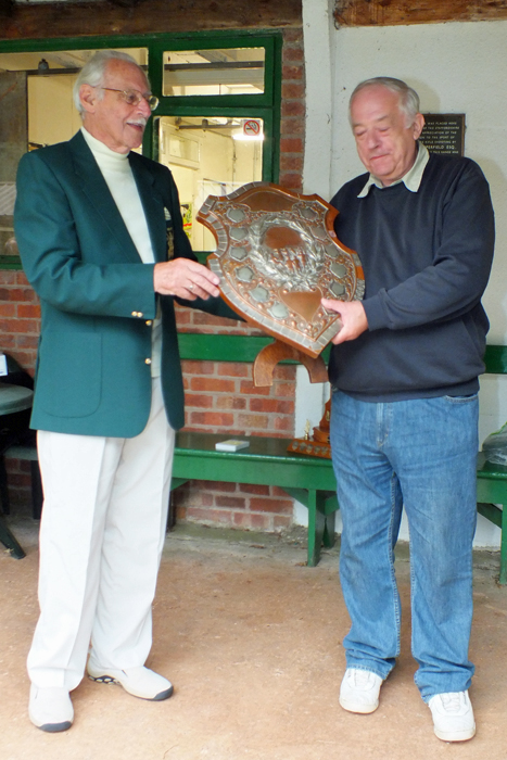 Photograph shows D. Bayley, pictured right, receiving on behalf of the City of Birmingham Rifle Club, the Association Shield from SSRA President - Major (Retired) Peter Martin, MBE.