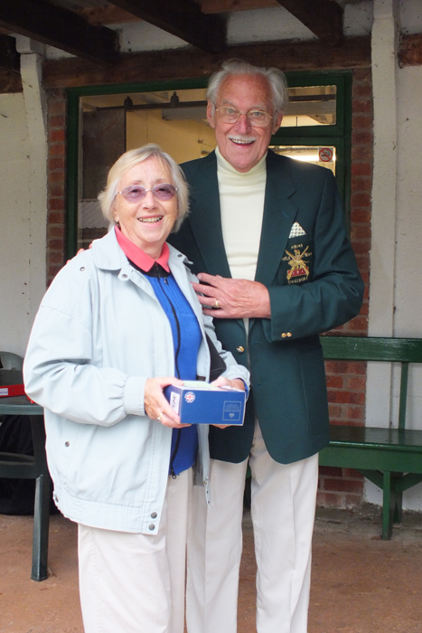 Photograph shows Mrs. I. Ball (pictured left) receiving the Class 'D' Fourth Place Prize from SSRA President, Major (Retired) Peter Martin, MBE (pictured right)