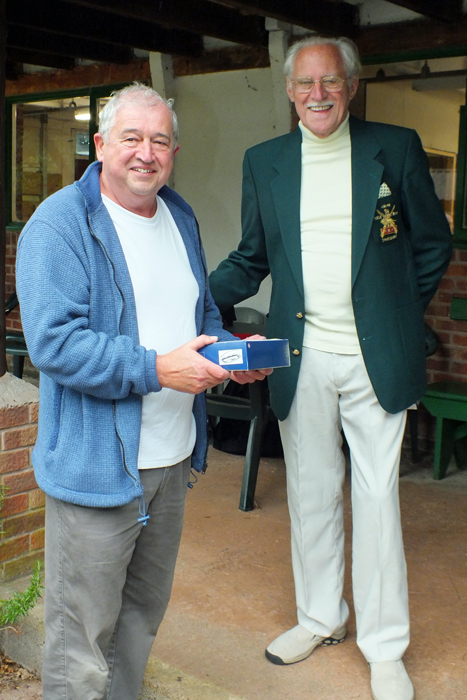 Photograph shows J. Wilshaw (pictured left) receiving the Class 'C' Third Place Prize from SSRA President, Major (Retired) Peter Martin, MBE (pictured right).
