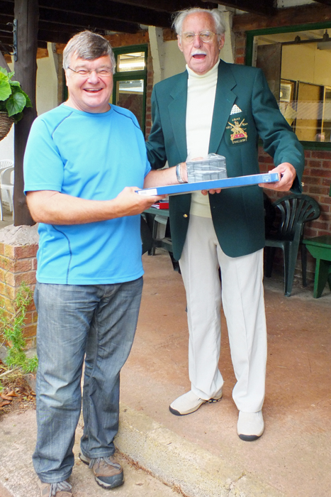 Photograph shows M. Doble (pictured left) receiving the Class 'B' First Place Prize from SSRA President, Major (Retired) Peter Martin, MBE (pictured right).