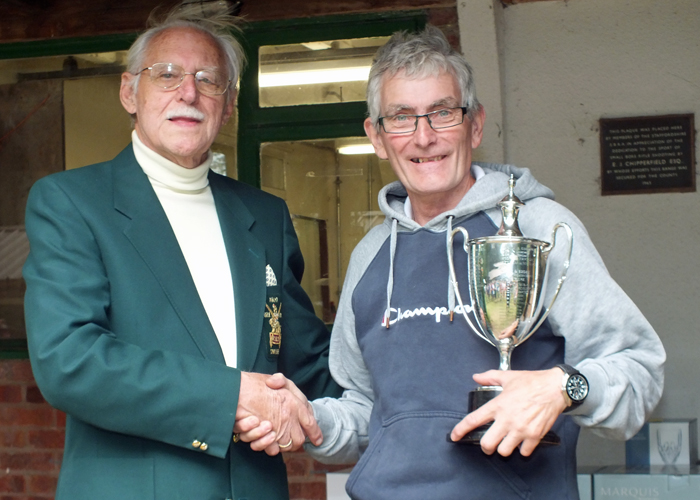 Photograph shows B. Tonks, pictured right, receiving The Michelin Cup for 2014 from SSRA President - Major (Retired) Peter Martin, MBE.