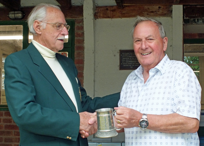 Photograph shows M. Willcox, pictured right, receiving on behalf of City of Birmingham Rifle Club, the Astor Tankard for 2014 from SSRA President - Major (Retired) Peter Martin, MBE.