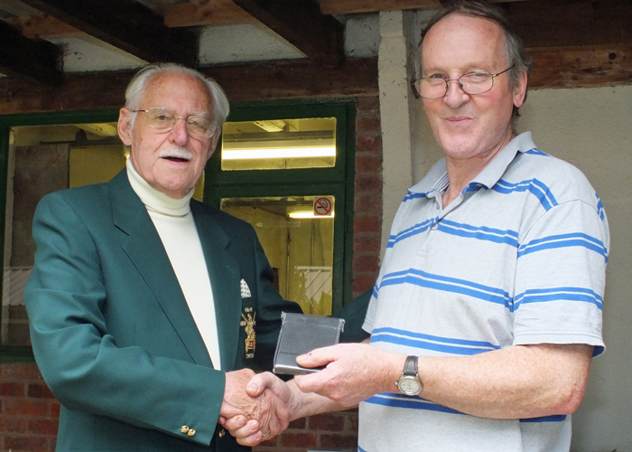 Photograph shows SSRA President - Major (Retired) Peter Martin MBE, pictured left - presenting the Miniature Rifle Cup Third Place Medal to G. Abbotts, pictured right.