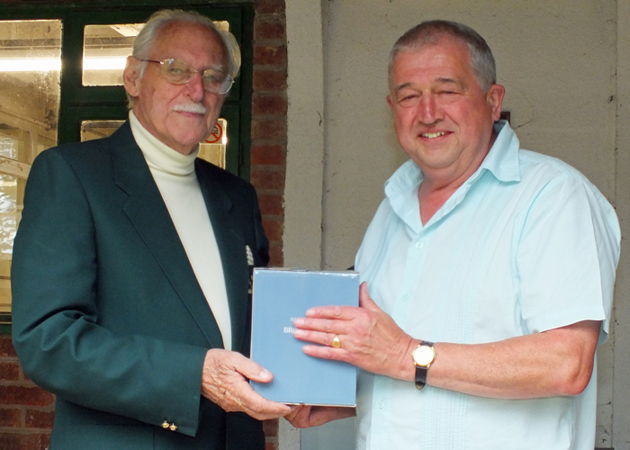 Photograph shows J. Wilshaw (pictured right) receiving the Class 'C' Second Place Prize from SSRA President, Major (Retired) Peter Martin, MBE (pictured left)