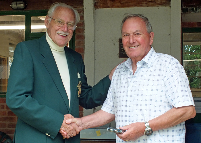 Photograph shows SSRA President - Major (Retired) Peter Martin MBE, pictured left - presenting the Swynnerton Cup Second Place Medal to M.B.P. Willcox, pictured right.