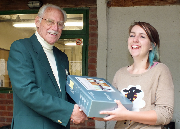 Photograph shows Miss A. Howarth (pictured right) receiving the Class 'D' First Place Prize from SSRA President, Major (Retired) Peter Martin, MBE (pictured left)