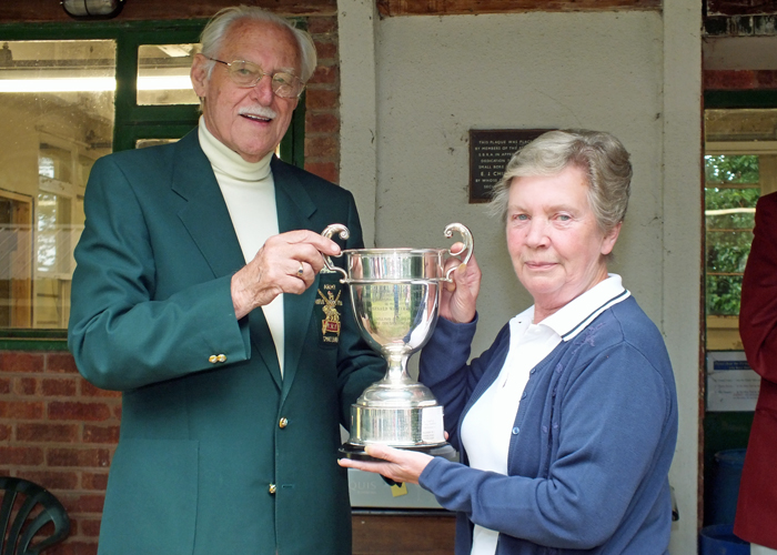 Photograph shows Mrs. M. Bayley, pictured right, receiving The R.W. De Nicolas Memorial Trophy for 2014 from SSRA President - Major (Retired) Peter Martin, MBE.