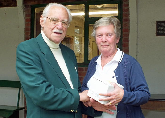 Photograph shows Mrs. M. Bayley (pictured right) receiving the Staffordshire Open 'Top Lady' Prize from SSRA President, Major (Retired) Peter Martin, MBE (pictured left)