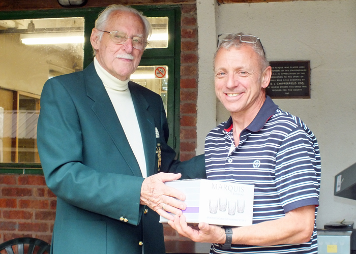 Photograph shows P. Knight (pictured right) receiving the Class 'B' Second Place Prize from SSRA President, Major (Retired) Peter Martin, MBE (pictured left)