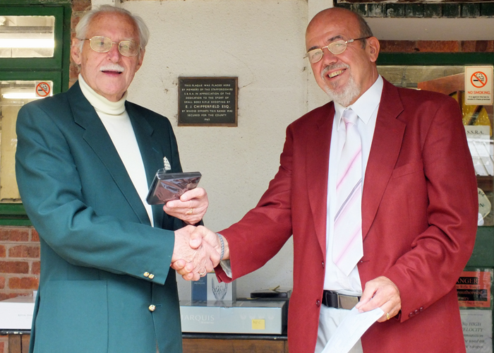 Photograph shows SSRA President - Major (Retired) Peter Martin MBE, pictured left - receiving the Swynnerton Cup Third Place Medal from Richard Tilstone, pictured right.