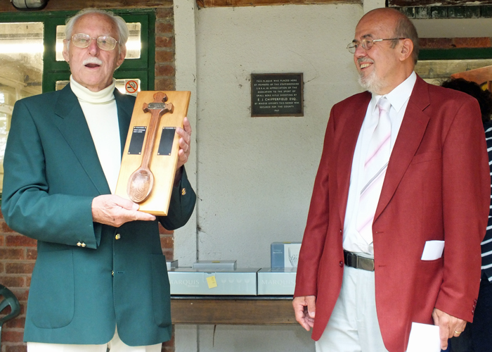 Photograph shows SSRA President - Major (Retired) Peter Martin, MBE, pictured left, receiving The Wooden Spoon for 2014 from SSRA Chairman - Richard Tilstone.