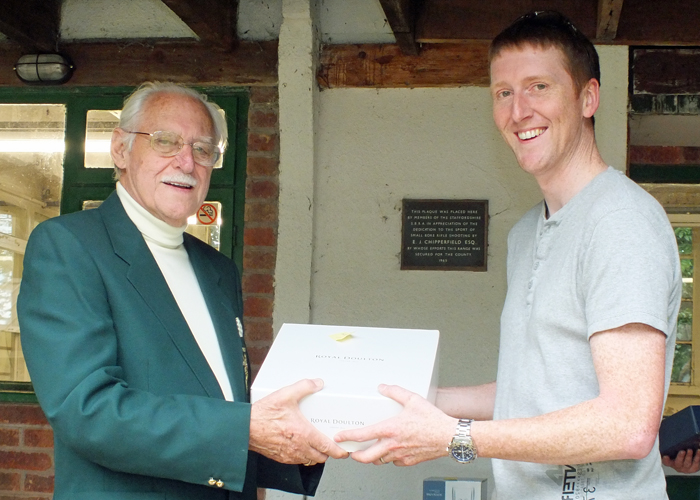 Photograph shows S. Green (pictured right) receiving the Class 'A' First Place Prize from SSRA President, Major (Retired) Peter Martin, MBE (pictured left)