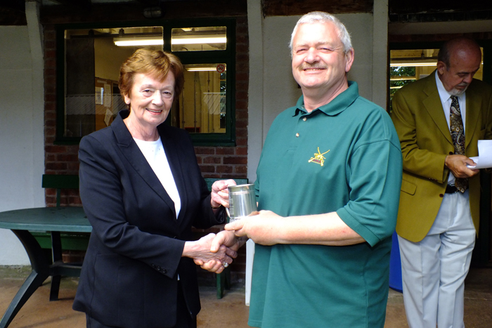 Photograph shows Mary Jennings, pictured left, presenting the Astor Tankard to Craig Howell, pictured right, who received it on behalf of Market Drayton.