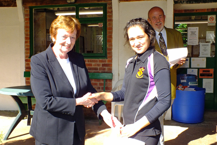 Photograph shows Mary Jennings, pictured left, presenting the Class D 1st Place Prize to Sunetra Chatterjee, pictured right.