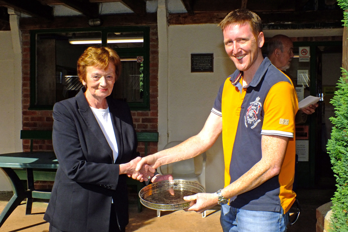 Photograph shows Mary Jennings, pictured left, presenting the 'Come Day - Go Day' Salver to Simon Green, pictured right.