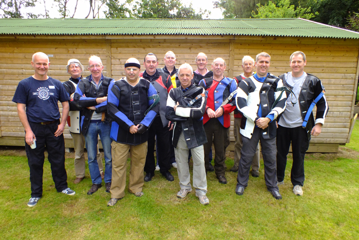 Photograph shows 12 members of the Rugeley Rifle Club - a fantastic turn-out for one club, and quite rare to get them all on one photo.