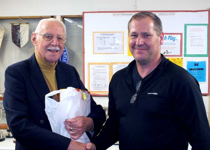Photograph shows SSRA President - Major (Retired) Peter Martin MBE, pictured left - presenting the Staffordshire Open - Class D - 1st Place Prize to Paul Baron, pictured right.