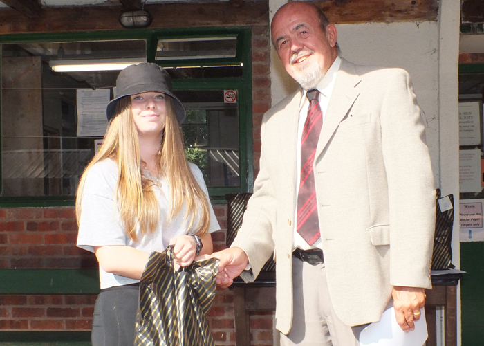 Photograph shows Anna Maughan (pictured left) receiving the Class 'C' 1st Place Open Prize 2019 from SSRA Chairman - Richard Tilstone (pictured right).