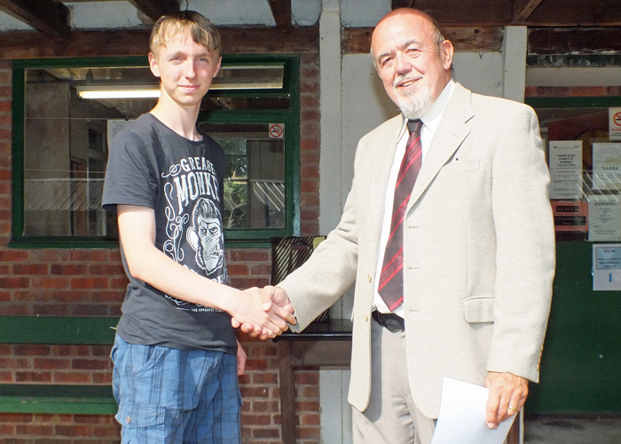Photograph shows Alan Bain (pictured left) receiving the Top Junior Open Prize 2019 from SSRA Chairman - Richard Tilstone (pictured right).